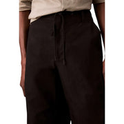 Calvin Klein Jeans men black cotton nylon trousers with drawstring waist and relaxed fit subtle texture