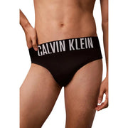 Black calvin klein jeans men swimwear polypropylene briefs with bold white logo band on the waistband
