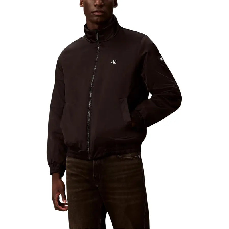 Schwarze Calvin Klein Jeans Herren-Blazer-Bomberjacke aus Polyester mit Reißverschluss und weißen, gestickten Logos auf Brust und Ärmeln