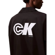 Black calvin klein jeans men blazer shown from the back with a bold white ck logo on the jacket’s back panel