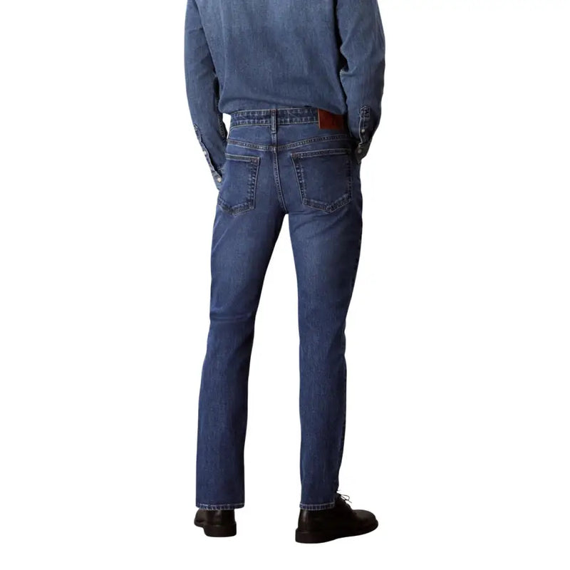 Calvin Klein Jeans men blue cotton denim jeans with classic straight-leg cut and brown leather belt loop