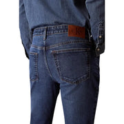 Back side of calvin klein jeans men blue cotton denim jeans featuring a brown leather brand patch on waistband