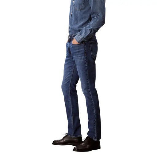 Calvin klein jeans men blue cotton denim jeans lv04rb735g with dark blue classic straight-leg cut and visible stitching details
