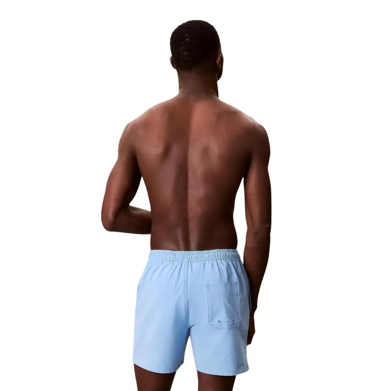 Calvin Klein Jeans men blue drawstring swimwear polyester with light blue relaxed fit swim trunks and elastic waistband