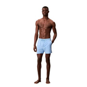 Light blue Calvin Klein Jeans men swim trunks with drawstring waistband made of polyester for casual swimwear use