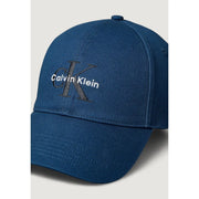 Deep blue Calvin Klein Jeans men organic cotton baseball cap with prominent white and dark gray embroidered ck logo