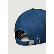 Blue denim baseball cap with adjustable strap and silver-tone metal buckle made from organic cotton by Calvin Klein Jeans