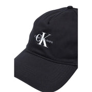Black Calvin Klein Jeans men cotton baseball cap with white embroidered logo and adjustable buckle closure