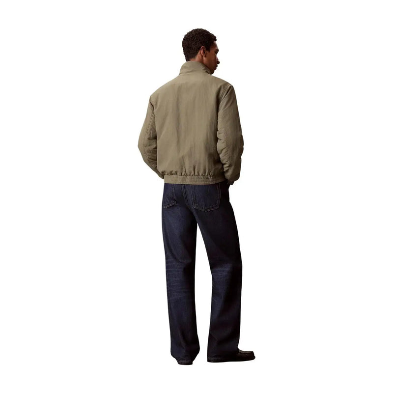 Calvin Klein Jeans men green nylon blazer turtleneck featuring a khaki bomber jacket with ribbed collar and cuffs made of lightweight fabric