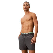 Calvin Klein Jeans men grey polyester swim shorts medium with dark gray trunks and light green waistband logo