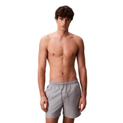 Calvin Klein Jeans men grey polyester swim shorts medium with a drawstring waistband for comfortable fit