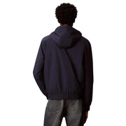 Calvin Klein Jeans men hooded blue polyester blazer with sleek modern design and ribbed cuffs front view