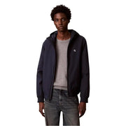Navy blue polyester hooded blazer for men by Calvin Klein Jeans featuring a white logo on the left chest