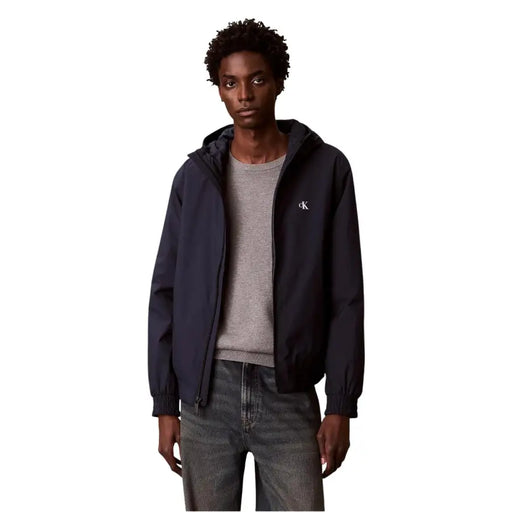 Navy blue polyester hooded blazer for men by Calvin Klein Jeans featuring a white logo on the left chest