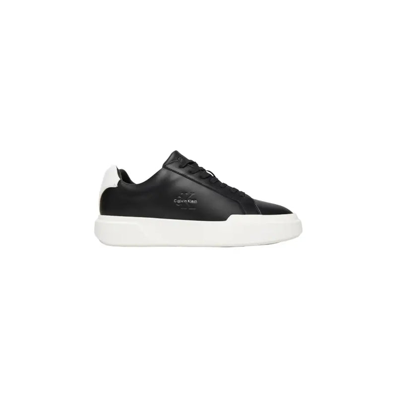 Calvin Klein Jeans men leather sneakers black featuring white rubber sole and heel tab in black leather