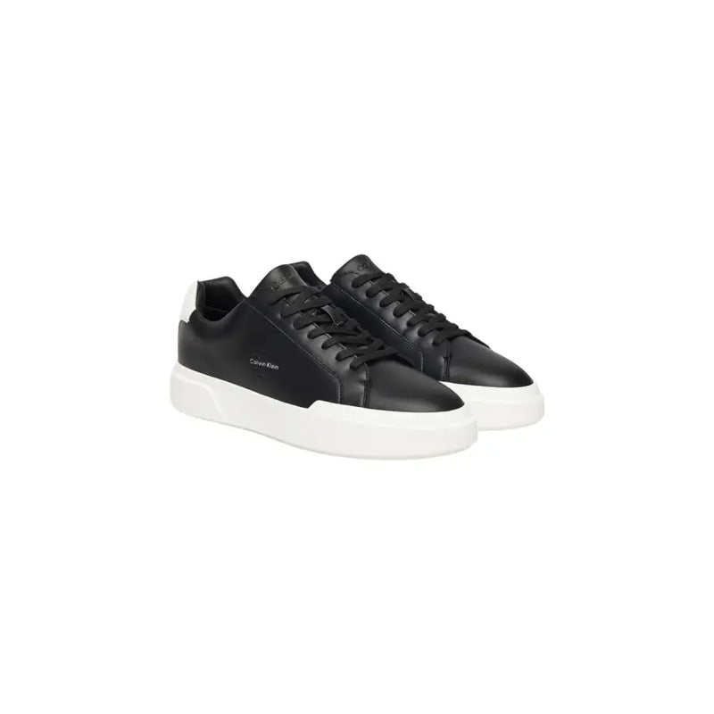 Calvin Klein Jeans men leather sneakers black with white rubber sole and contrasting white heel tab shown from back side