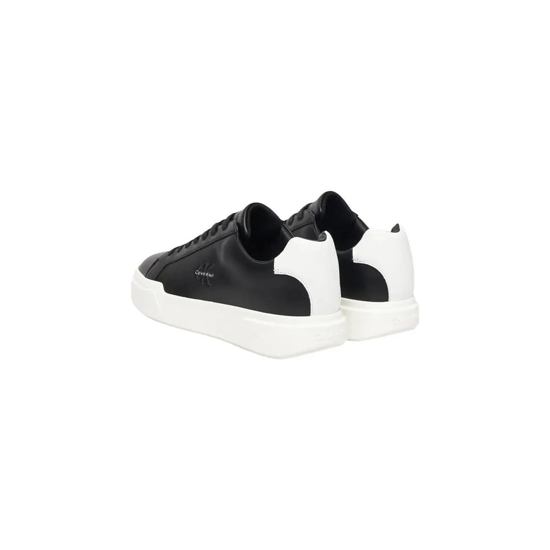 Calvin Klein Jeans men leather sneakers black with sleek leather upper white rubber sole and subtle branding on side