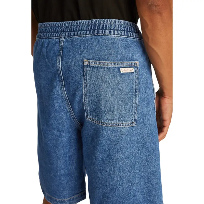 Back view of calvin klein jeans men light blue cotton denim shorts with elastic waistband and branded back pocket