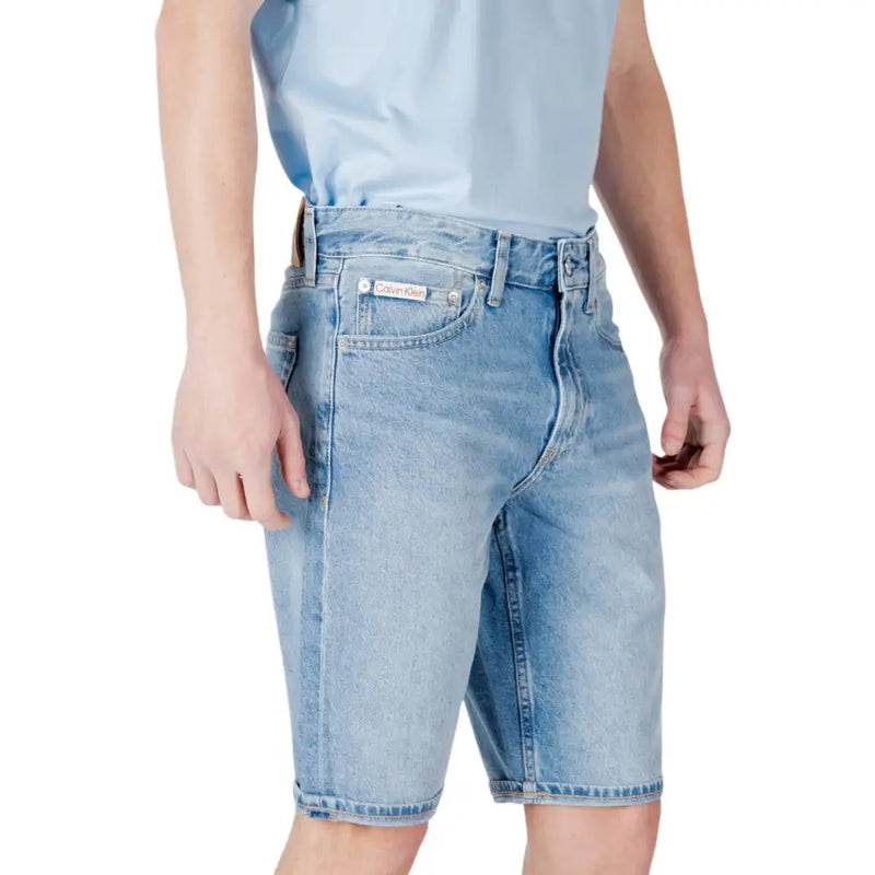 Calvin klein jeans men light blue cotton shorts with classic five-pocket design and brand label on back pocket view