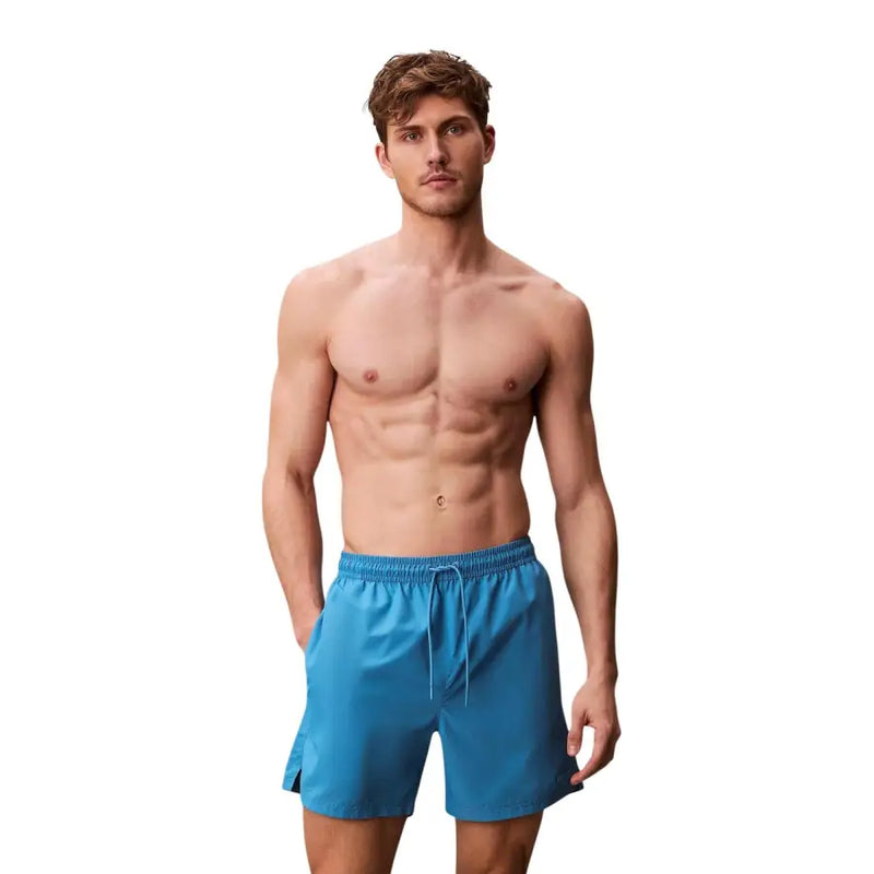 Calvin Klein Jeans men light blue polyester swim shorts with bright blue drawstring waistband for swimming