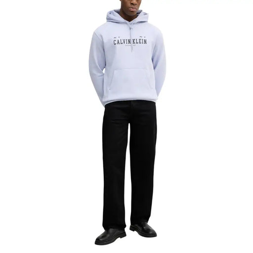Light blue Calvin Klein Jeans men lilac cotton hoodie with black lettering and front pocket in a hooded sweatshirt style