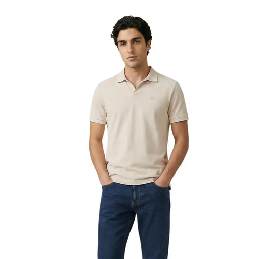 Beige short sleeve polo shirt with subtle embroidered logo made of cotton for men by Calvin Klein Jeans size L