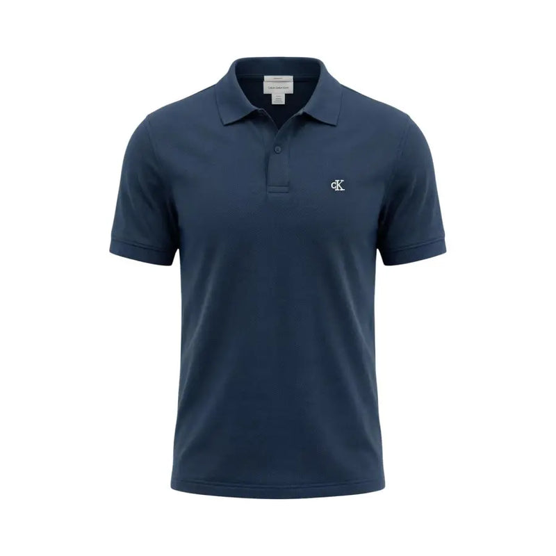 Navy blue textured cotton short sleeve polo shirt by Calvin Klein Jeans with white CK logo on left chest size L