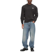 Calvin Klein Jeans Schwarzes Herren-Sweatshirt aus Baumwolle mit Rundhalsausschnitt, langen Ärmeln und kleinem weißen Logo auf der Brust.