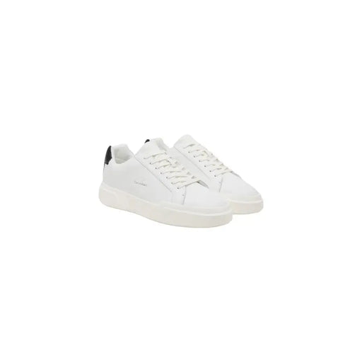 Calvin Klein Jeans men sneakers in white leather with black heel tabs featuring a minimalist fall winter design
