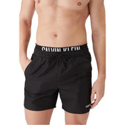 Short de bain noir Calvin Klein avec logo blanc sur la ceinture et le côté, en polyester pour homme