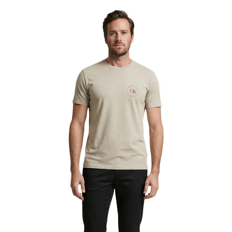 Beige Calvin Klein Jeans men t-shirt with subtle red CK logo on left chest, casual cotton top