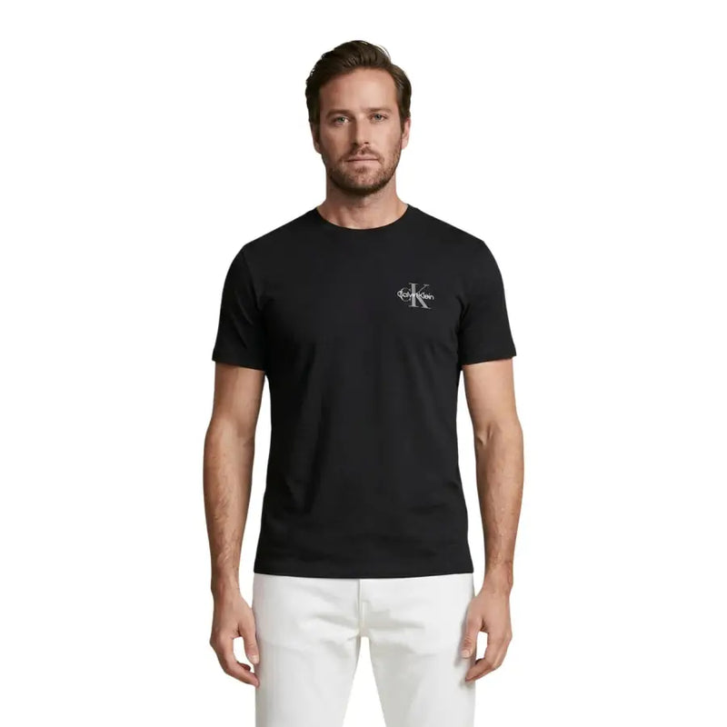 Calvin Klein Jeans men black cotton t-shirt featuring a subtle white logo on the left chest for casual wear