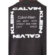Black Calvin Klein Jeans men t-shirt with bold white graphic and modern font displaying brand name and New York address