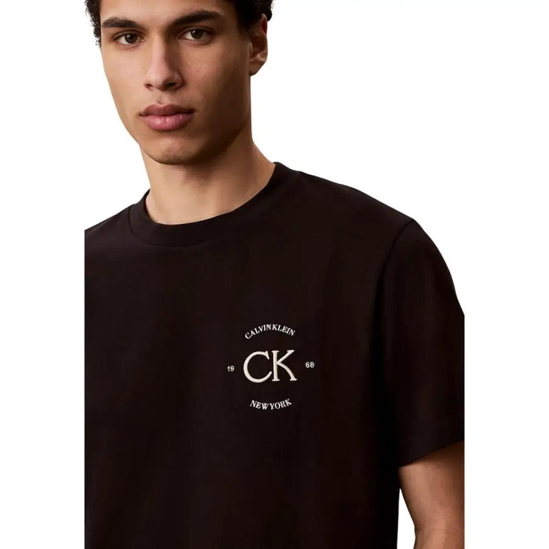 Black Calvin Klein Jeans men cotton t-shirt with cream embroidered ck and 1968 New York logo, round neck, size S