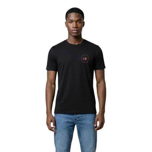 Calvin Klein Jeans men black t-shirt with subtle pink circular logo on left chest for casual wear