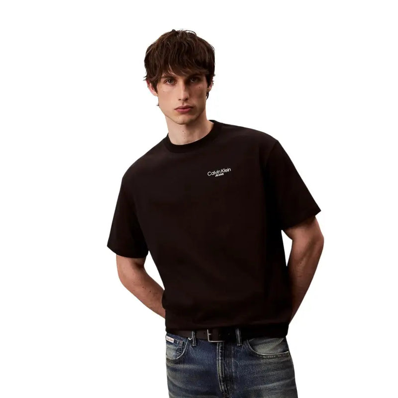 Schwarz Calvin Klein Jeans Kurzarm-T-Shirt für Herren aus Baumwolle mit dezentem weißen Logo auf der Brust