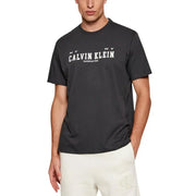 Black Calvin Klein Jeans men t-shirt with white ny Calvin Klein established 1969 graphic across the chest
