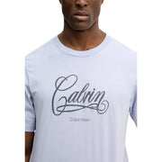 Light blue cotton Calvin Klein Jeans men t-shirt with dark gray cursive Calvin logo and round neck in size S