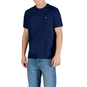 Marineblau Calvin Klein Jeans Herren-T-Shirt mit kleinem weißen Logo auf der linken Brust, aus 100 % Baumwolle