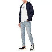Marineblau Calvin Klein Jeans Kapuzenpullover mit Reißverschluss, weißem runden Logo auf der Brust und passendem Emblem am linken Ärmel