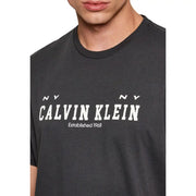 Dark gray Calvin Klein Jeans men t-shirt with bold white logo and NY NY established 1968 printed on front