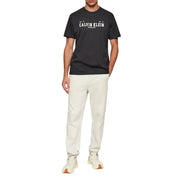 Black Calvin Klein Jeans men t-shirt with white ny Calvin Klein logo and founded 1969 text on cotton fabric