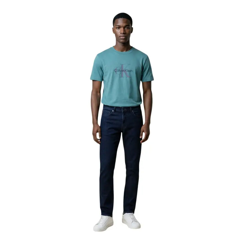 Türkisfarbene Calvin Klein Jeans für Herren t-shirt mit dezentem, verblasstem Logo auf der Brust aus weichem Baumwollstoff
