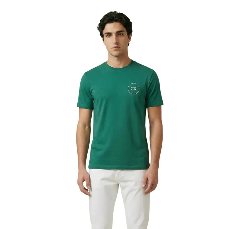 Green short-sleeved cotton t-shirt with white circular logo on left chest by Calvin Klein Jeans for men