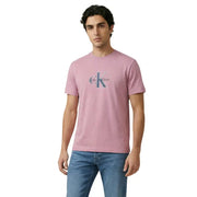A soft pink Calvin Klein Jeans men t-shirt featuring a classic logo print on the chest in cotton fabric