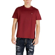 Calvin Klein Jeans men t-shirt in maroon with small embroidered logo on left chest, made from soft cotton fabric