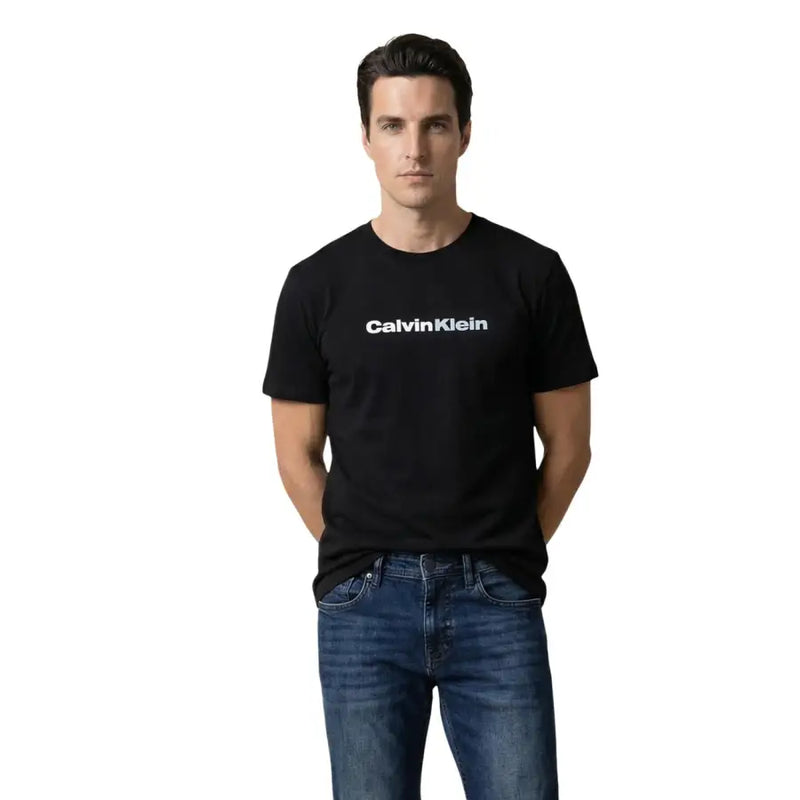 Black calvin klein jeans men’s cotton t shirt with white logo print across the chest for casual wear
