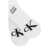 Chaussettes basses blanches Calvin Klein Jeans pour homme, avec logo CK noir bien visible sur le pied, pour un style décontracté.