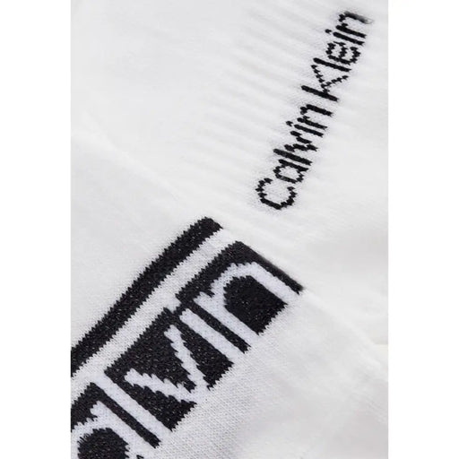 White Calvin Klein Jeans ankle socks with black knitted branding designed for men underwear collection