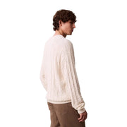 Cream-colored cable-knit cotton sweater with textured geometric pattern from calvin klein jeans men knitwear